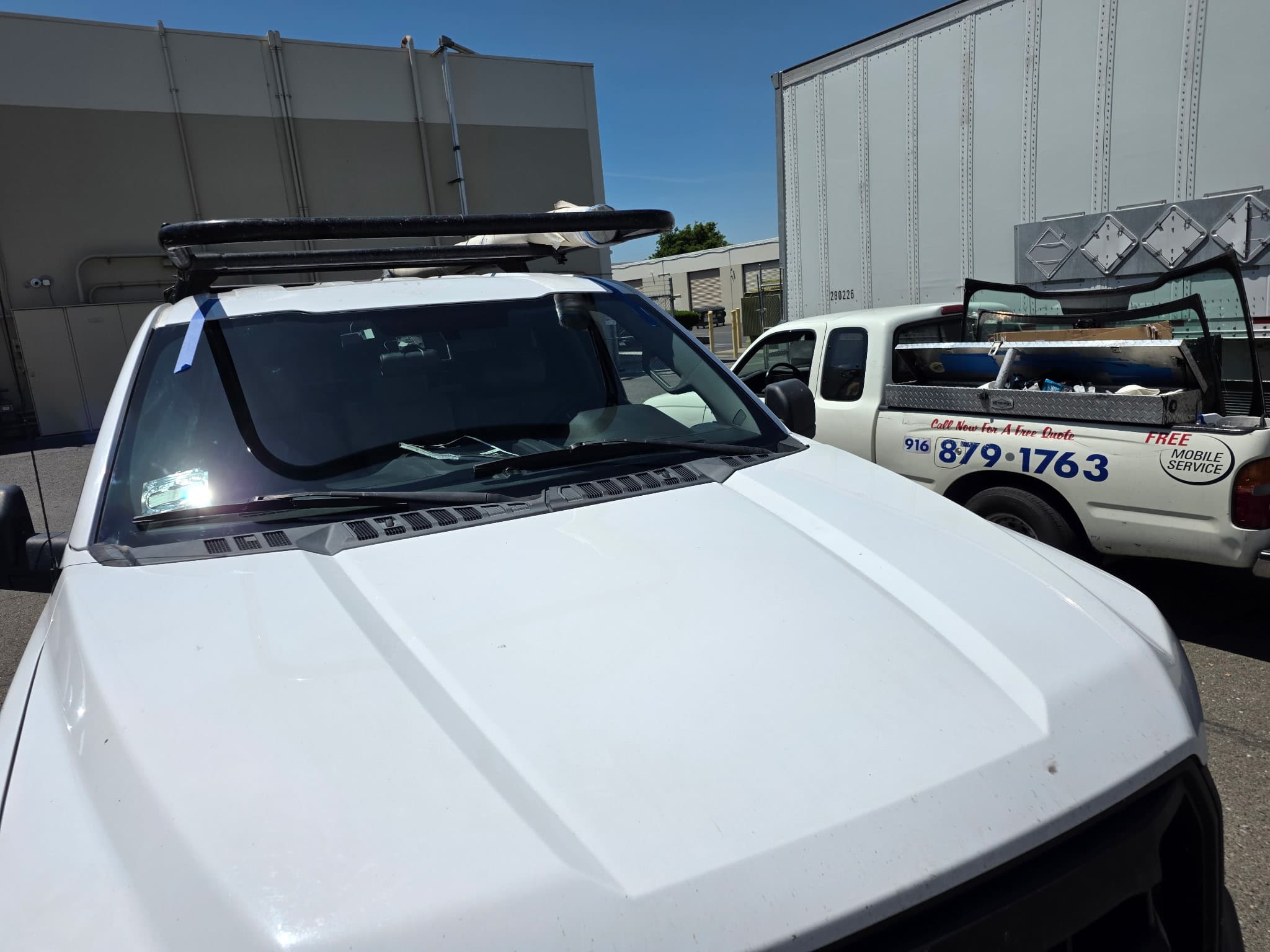 Ford windshield on the truck rack ready to install