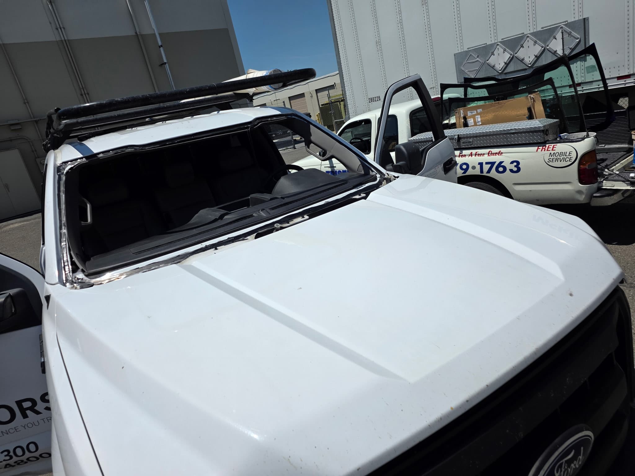 Ford windshield install in a Sacramento yard